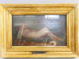 une photo d'un tableau représentant une femme nue, dans un cadre doré