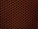 an image of a close up of a black and orange skirt