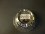 a close up of a glass jar with a label on it