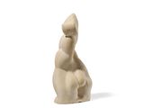 an image of a statue of a person sitting on a white surface