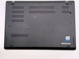 a black laptop that is sitting on a white table