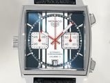 a close up of a watch with a black strap