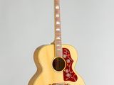 a close up of a guitar on a white background