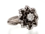 an image of a diamond and black enamel flower ring