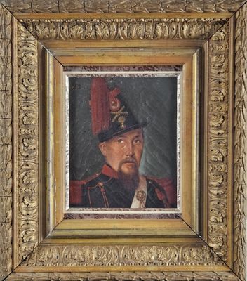 portrait of a man in a military uniform in a gold frame