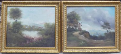 two paintings of trees and a house on a hill are hanging on a wall