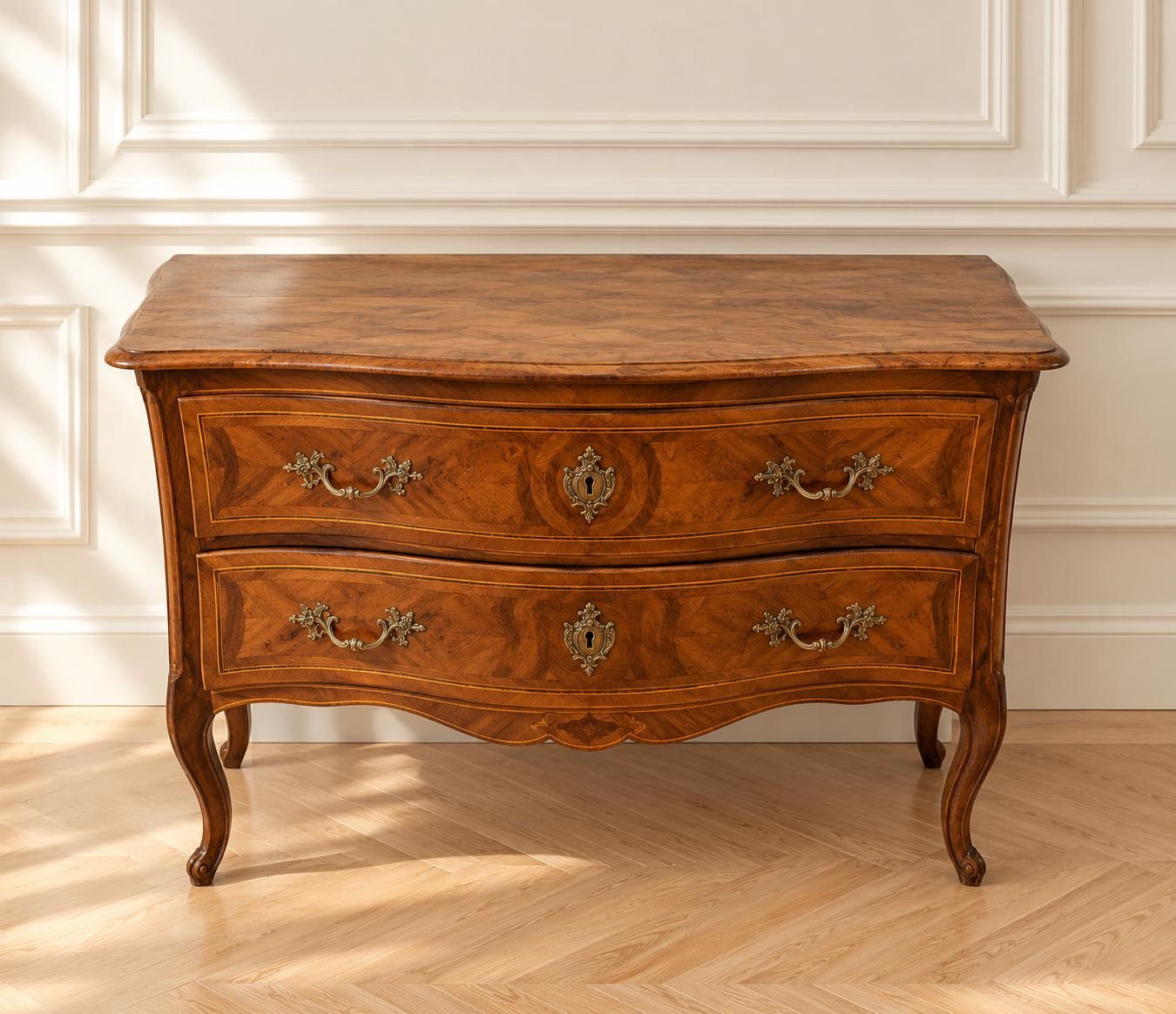 Une commode en bois fruitier ouvrant par deux larges tiroirs…