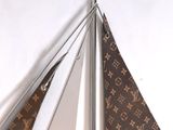 an image of a sailboat made out of louis vuitton fabric