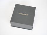 an image of a black box with a gold logo on it