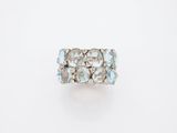 a close up of a ring on a white surface