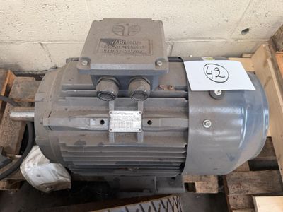 an electric motor that is sitting on a pallet