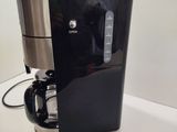 a coffee maker that is sitting on a counter