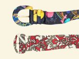 two belts with different designs on them on a white background