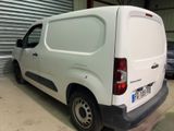 a white van that is parked in a garage