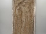 an image of a sculpture of a woman in a wooden frame