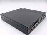 the back of a black laptop computer sitting on top of a white surface