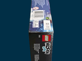 a box of toothpaste sitting on a blue surface