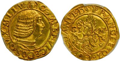 a gold coin with an image of a man on it