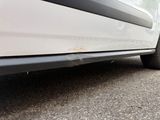 a car that is parked on the side of the road