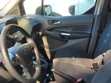 the interior of a car with a steering wheel and a dashboard