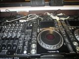 a dj controller sitting on top of a table