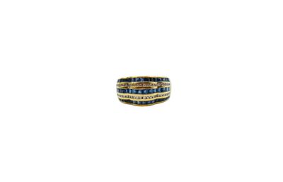 an image of a ring with blue and white diamonds on a white background