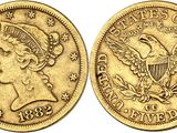 une pièce d'or sur laquelle figure un aigle au recto et au verso