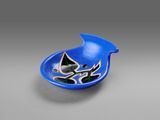 a blue bowl with a bird on it sitting on top of a table