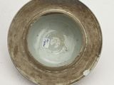 a small bowl that is sitting on a table
