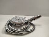 a shower head with a shower hose attached to it
