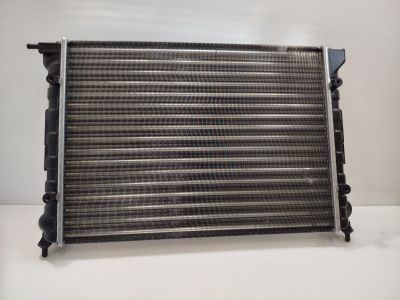 a close up of a radiator on a white surface