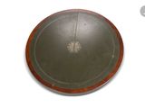 an image of a wooden plate on a white surface
