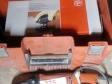 a tool in a case that is sitting on the floor