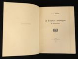 an open book with a picture of a cat on it