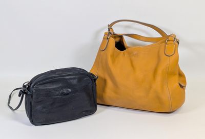 leather handbag and cross body bag on a white background