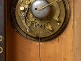a clock that is hanging on the wall in the room