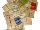 a pile of old papers with drawings on them