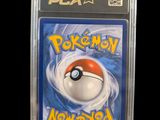 a close up of a card with a pokemon figure on it