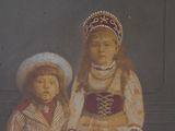 an old picture of a woman and a child