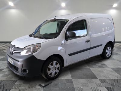 a picture of a white van on a checkered floor