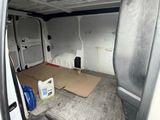 a white van with a box in the back of it
