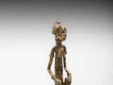 paire de figurines en bronze représentant un homme et une femme