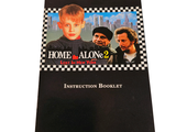 a black and white book with a picture of two men