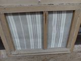 a picture of a window that is being installed in a room