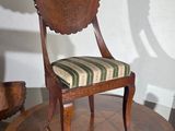 a chair that is sitting on top of a table
