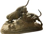 bronze statue of a bull and a dog fighting on a rock