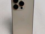 the back of a white iphone 11 with three camera lenses on it
