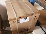 a box that is sitting on the floor next to some boxes
