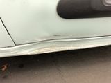a close up of a car door handle and the door handle is missing