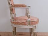 a chair that is sitting on the floor in the room
